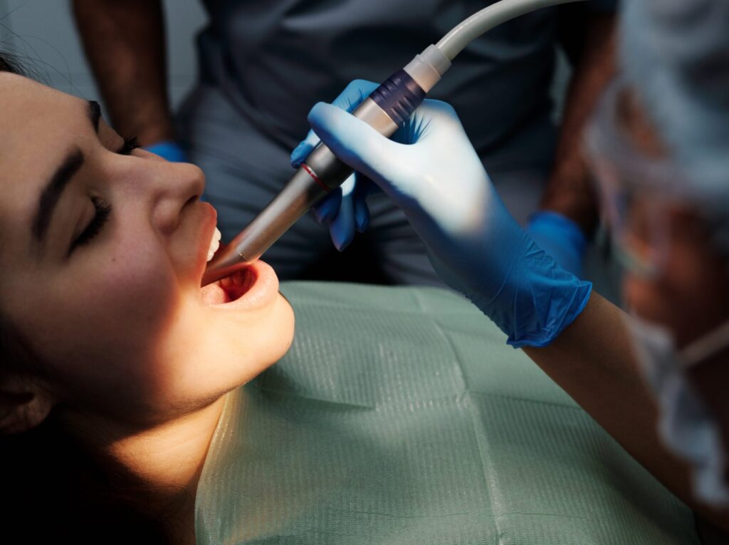 Girl getting tooth hygiene